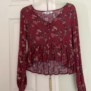 Rose colored floral peplum cropped blouse with button detail